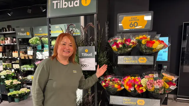 Vannessa med blomster fra mester grønn