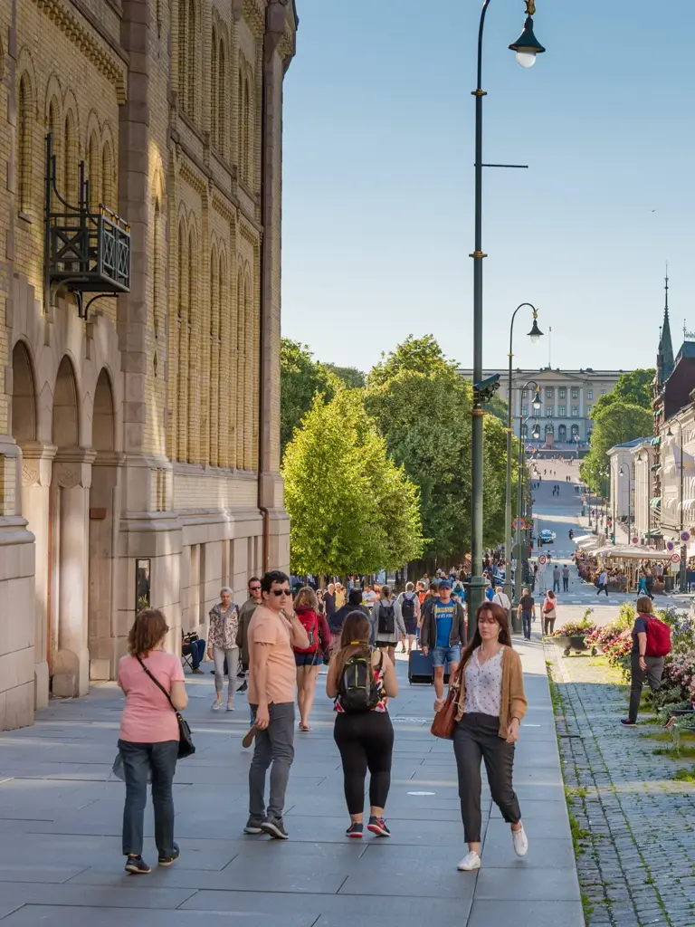 Oslo, Norway – July 17, 2017: People enjoying the summer at central station  street in Oslo, Norway