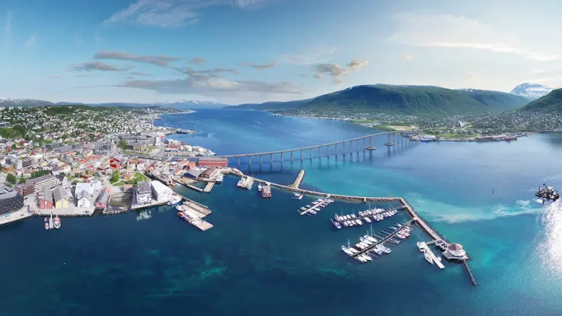 This is an aerial panoramic view over Tromso Bridge crossing Norwegian Sea. It connects Tromsdalen on the mainland and the island of Tromsøya.