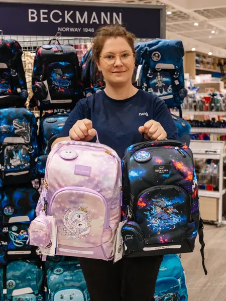 dame holder skolesekker