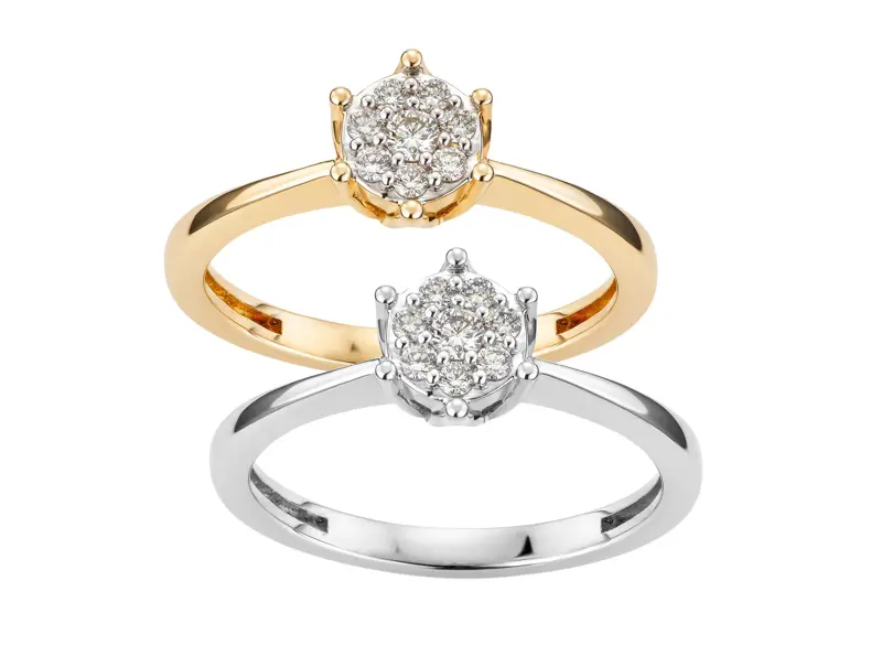 Diamantringer i gult og hvitt gull med blomsterformet fatning.