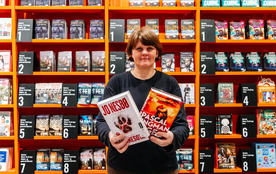 Person som holder bøker