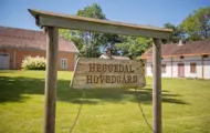 Bilde av skiltet til Heggedal Hovedgård