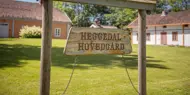 Bilde av skiltet til Heggedal Hovedgård
