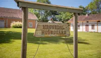 Bilde av skiltet til Heggedal Hovedgård