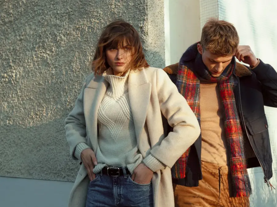 Mann og dame med moteklær