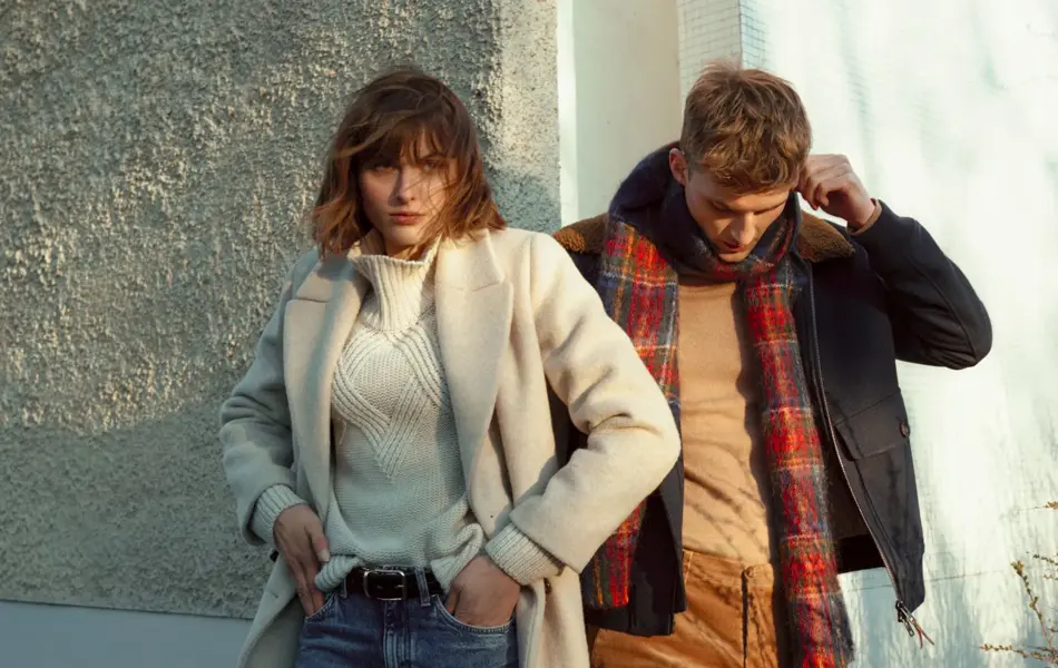 Mann og dame med moteklær