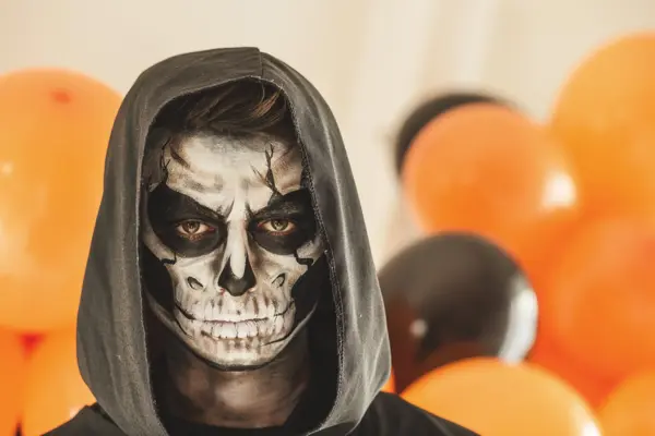 Copy space shot of young man disguised as grim reaper. 