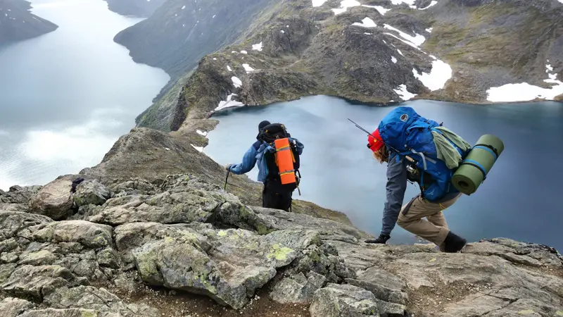 Jotunheimen: People hike the Besseggen trail in Jotunheimen National Park, Norway. Norway had almost 5 million foreign visitors in 2011.