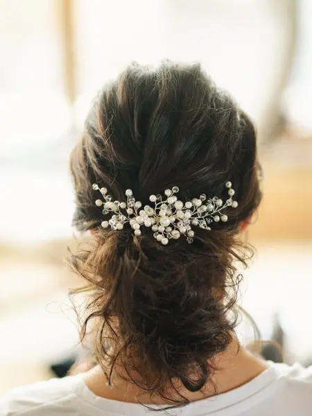 Wedding hair accessory. Bride's preparations.