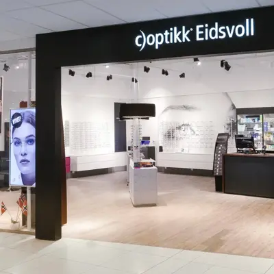 C)Optikk Eidsvoll