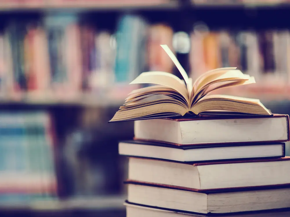 Book in library with open textbook,education learning concept