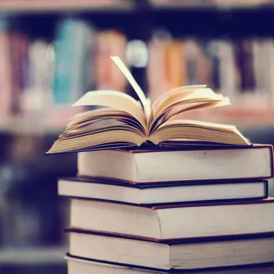 Book in library with open textbook,education learning concept