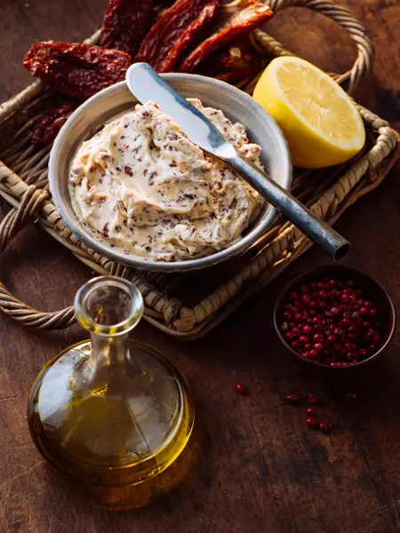 Herb butter with dried tomatoes and olives