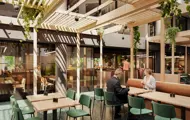 3D-illustrasjon av kantinen i Vika Atrium, med møbler i lyst treverk, grønne klatreplanter og naturlig lys som kommer inn fra taket