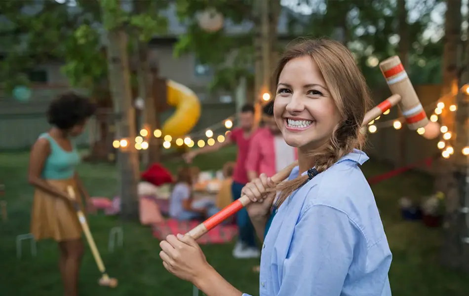 Dame med krokket kølle