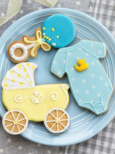 Blue and yellow cookies for a baby shower