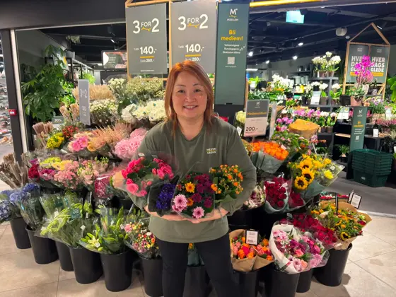 Vannessa med blomster fra mester grønn