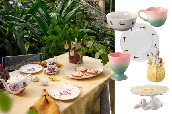 Bord dekket med servise, gul duk, blomster og pynt. Bolle og tallerken med kaniner, eggeholder, kopp, kaninpynt, kaninfat.