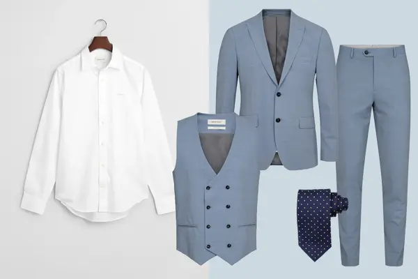 Hvit skjorte, gråblå dressjakke, vest og bukse, mørk blått slips.