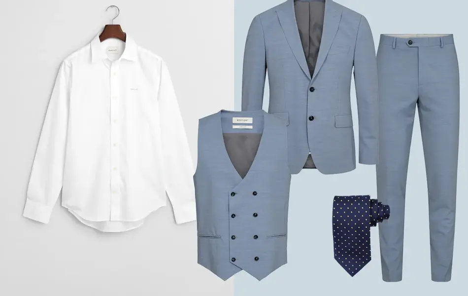 Hvit skjorte, gråblå dressjakke, vest og bukse, mørk blått slips.