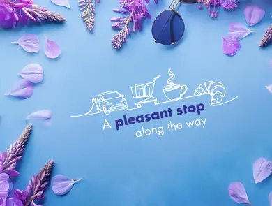 Grafisk blått bilde med blomster og tekste "A pleasant stop along the way"