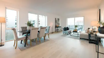 Interiørbilde av stue og spisestue fra en leilighet på Strømmen Verksted