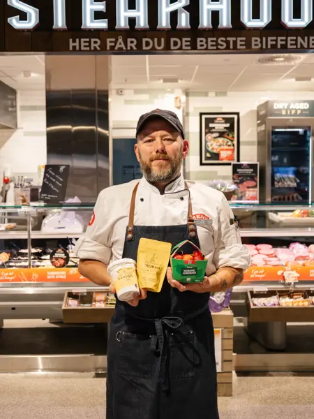 mann holder matvarer