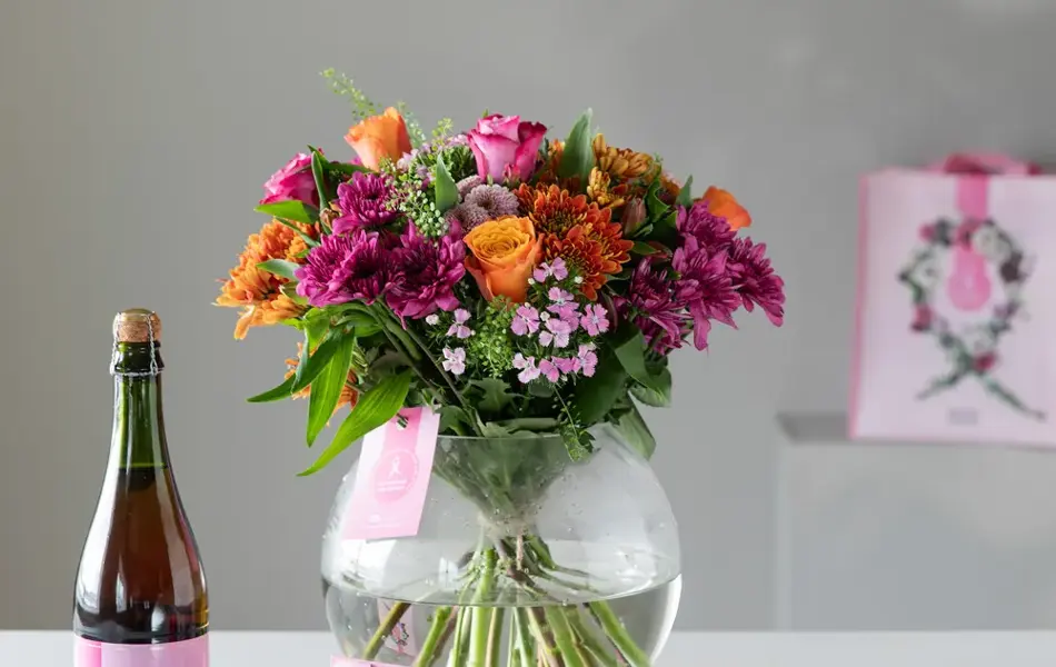 Rosa sløye produkter fra Mester Grønn, blosmterbuketter, pose og lakris