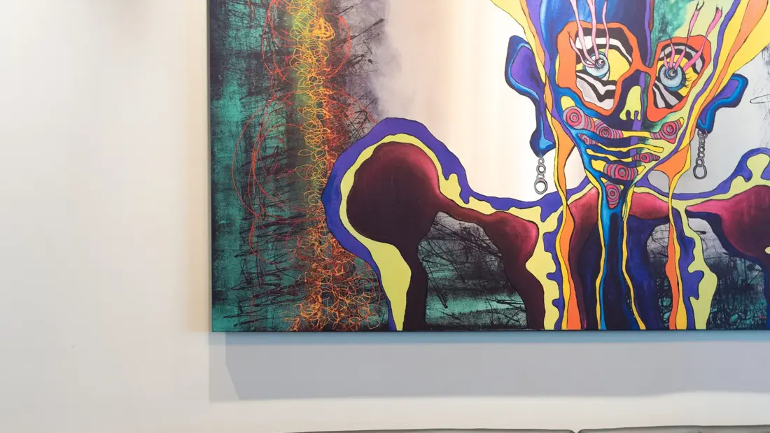 Lobby med stort maleri og svart skinsofa på Thon Hotel Parken i Kristiansand sentrum. Den tidligere håndspilleren og kunstneren Isabel Blanco står bak utsmykningen av hotellet. 