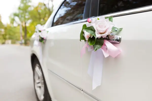 Luxury wedding car decorated with flowers