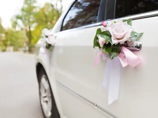 Luxury wedding car decorated with flowers