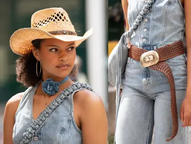 detaljbilde av cowboyhatt, choker og olatopp, brunt lærbilde jeans og jeansveske