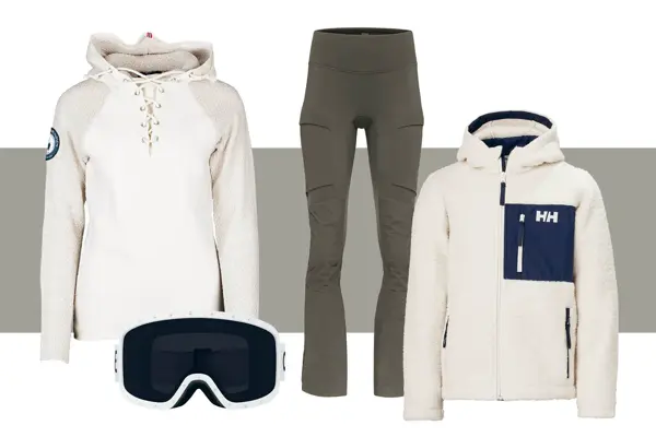 Hvit skigenser med hette, alpinbriller, skibukse og hvit teddyjakke til junior