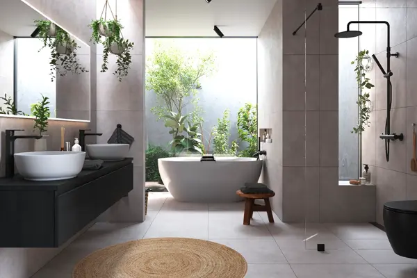 Baderom med hvite filser, badekar, grønne planter, dusj og vask, speil og toalett.