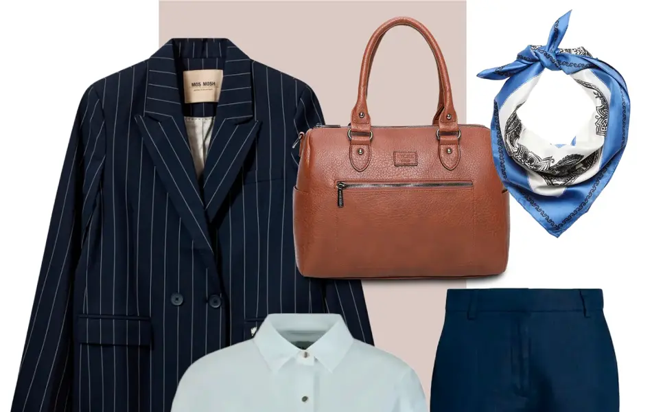 Blå med tynne hvite striper blazer, brun veske, blåmønstret halstørkle, blå penbukse, hvit skjorte, solbriller, blå pumps.