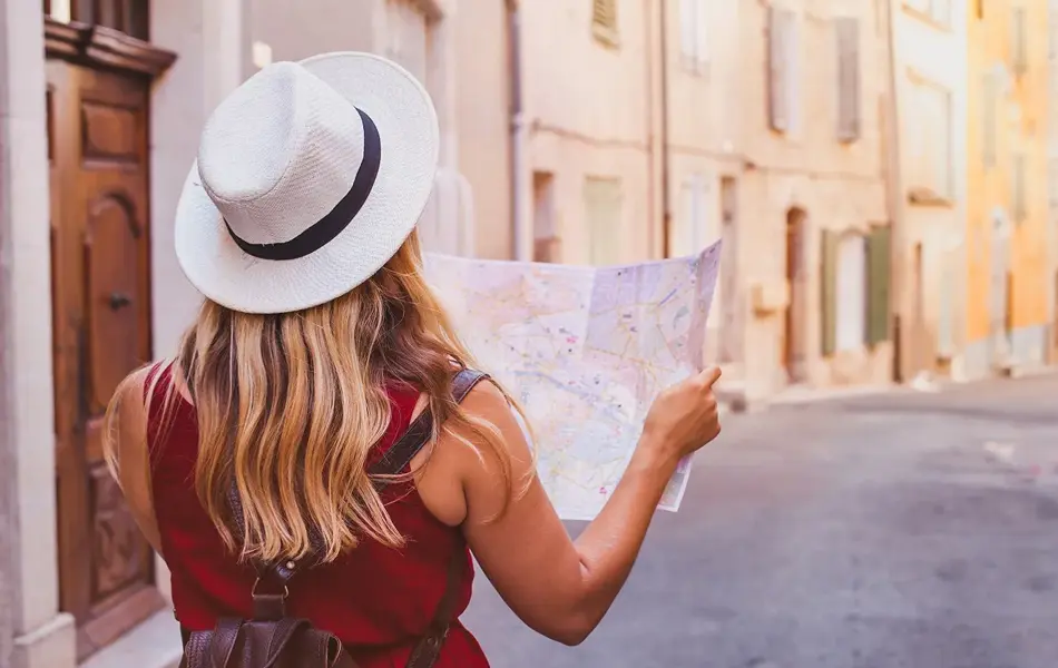 travel to Europe, tourist looking at map on the street, summer holidays sightseeing tourism