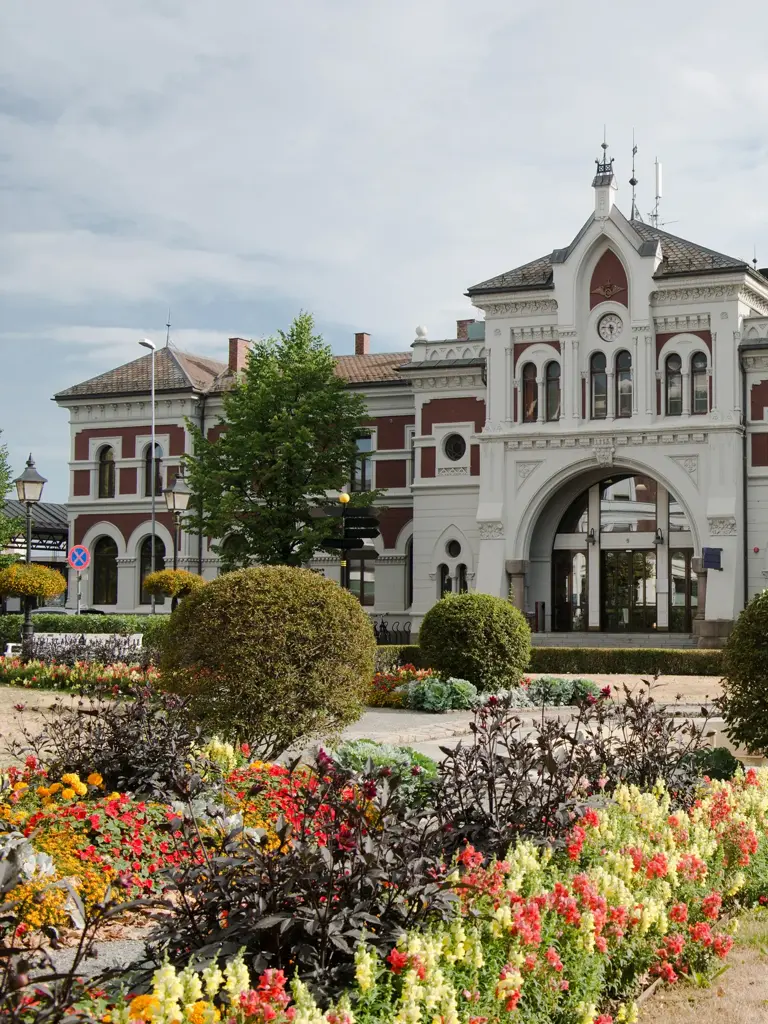 scenic view of Hamar station building and flowers, Hedmark, Norway