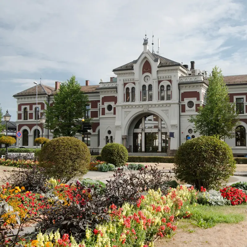 scenic view of Hamar station building and flowers, Hedmark, Norway
