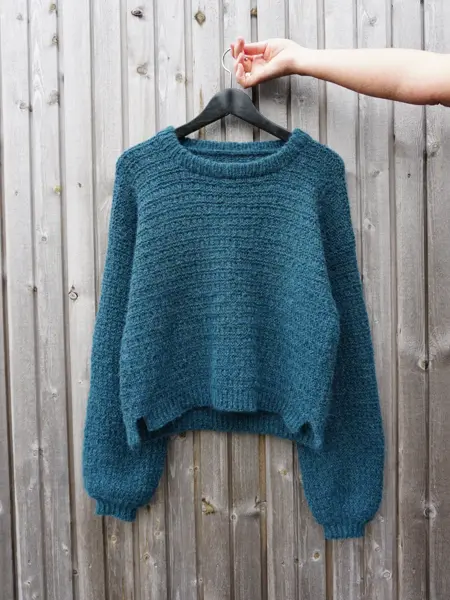 Blå strikket genser