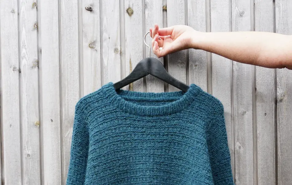 Blå strikket genser