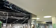 Bildet er fra kjøpesenteret Sørlandssenteret i Kristiandsand. Man ser et utvalg av butikkene på senteret.