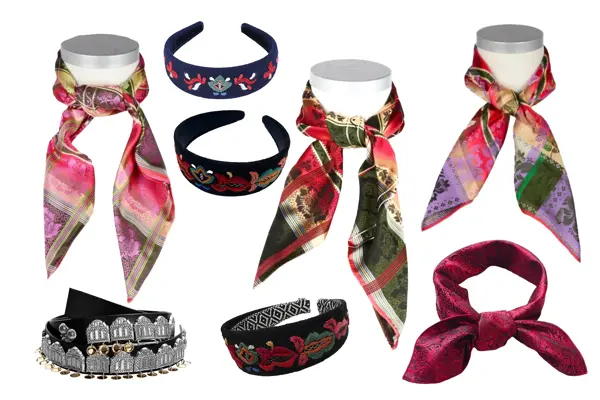 Ulike fargerike tørkler til bunad, ulike broderte hårbøyler til bunad og et bunadsbelte.