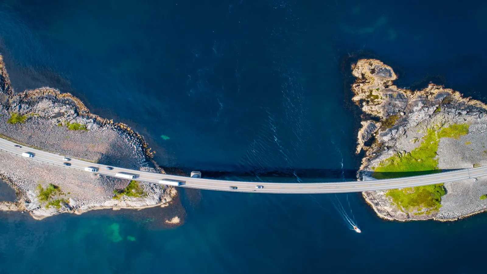 The Atlantic Ocean Road or Atlantic Road (no: Atlanterhavsveien) is a 5.2 mile (8.3km) long section of road which runs through an archipelago in Møre og Romsdal, Norway.  It's built on a series of islands and skerries which are connected by viaducts, causeways, and eight bridges.  The arched bridge pictured here is the Storseisundet Bridge, the most prominent bridge on this section of road.