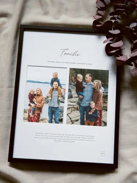 bilderamme med plakat som ligger på laken