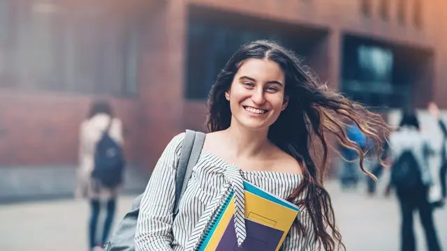Schoolgirl walking outdoors