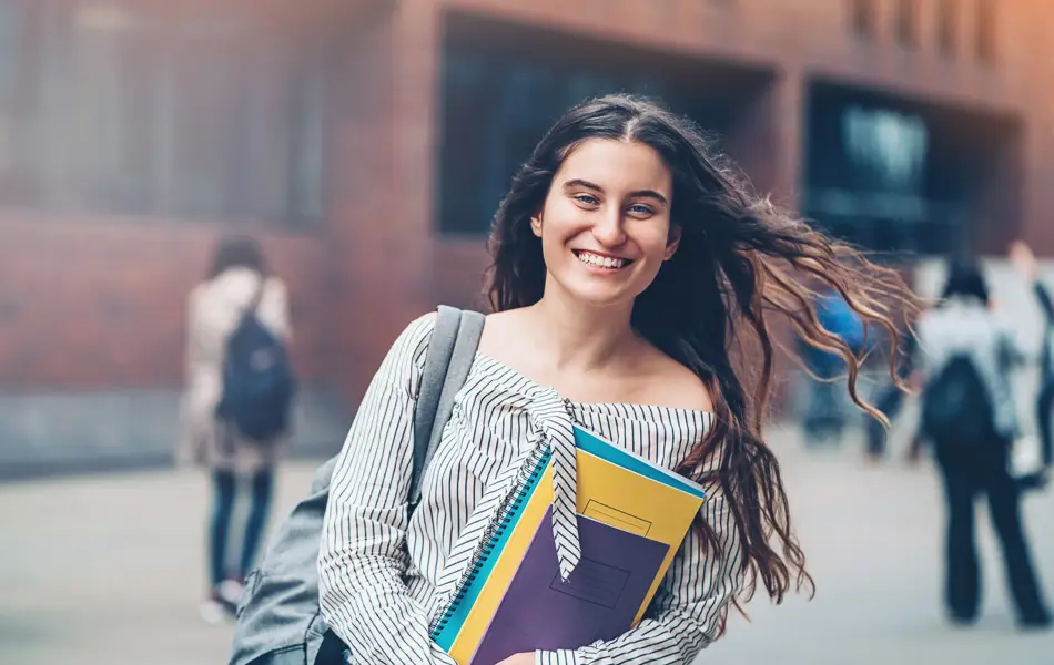 Schoolgirl walking outdoors