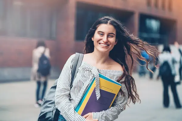 Schoolgirl walking outdoors