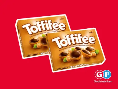 Två askar Toffifee-choklad med hasselnöt och kola.