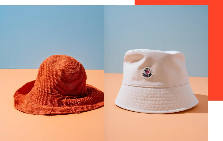 Beskytt hodet med oransje solhatt fra Ny & Ne, elle bøttehatt fra Monclair, hos Follestad.